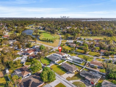 Welcome to an impeccable, move-in-ready corner lot Ranch home in on St. Petersburg Country Club in Florida - for sale on GolfHomes.com, golf home, golf lot