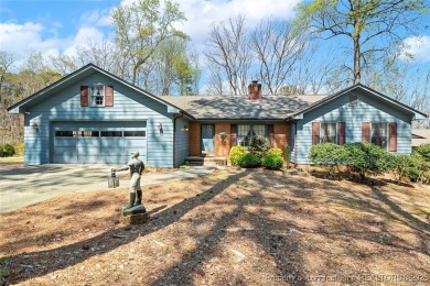 Say *Welcome Home* to this adorable English cottage-style home on Carolina Trace Country Club in North Carolina - for sale on GolfHomes.com, golf home, golf lot
