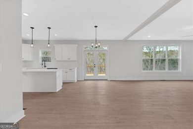 Welcome to the Travis floor plan - a thoughtfully designed 4 on The Plantation Golf Club in Georgia - for sale on GolfHomes.com, golf home, golf lot