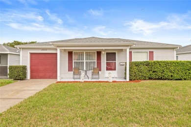 Welcome to this immaculately kept 2-bedroom, 2-bathroom bungalow on Tampa Bay Golf and Country Club in Florida - for sale on GolfHomes.com, golf home, golf lot