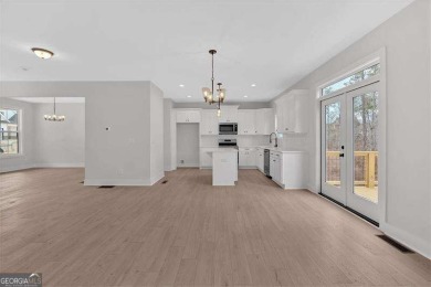 Welcome to the Travis floor plan - a thoughtfully designed 4 on The Plantation Golf Club in Georgia - for sale on GolfHomes.com, golf home, golf lot