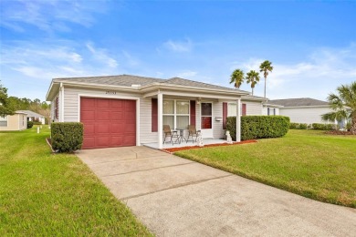 Welcome to this immaculately kept 2-bedroom, 2-bathroom bungalow on Tampa Bay Golf and Country Club in Florida - for sale on GolfHomes.com, golf home, golf lot