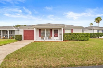 Welcome to this immaculately kept 2-bedroom, 2-bathroom bungalow on Tampa Bay Golf and Country Club in Florida - for sale on GolfHomes.com, golf home, golf lot