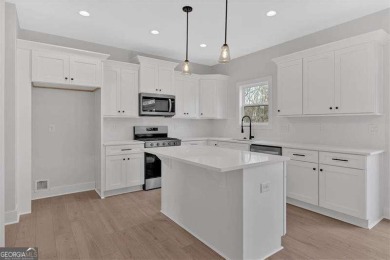 Welcome to the Travis floor plan - a thoughtfully designed 4 on The Plantation Golf Club in Georgia - for sale on GolfHomes.com, golf home, golf lot