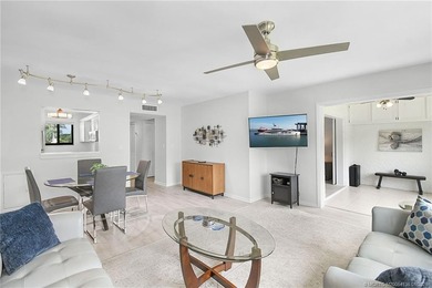 Peaceful and tranquil living comes to mind when you enter this on Miles Grant Country Club in Florida - for sale on GolfHomes.com, golf home, golf lot