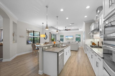Situated in the desirable Country Club East of Lakewood Ranch on Ritz-Carlton Members Golf Club in Florida - for sale on GolfHomes.com, golf home, golf lot