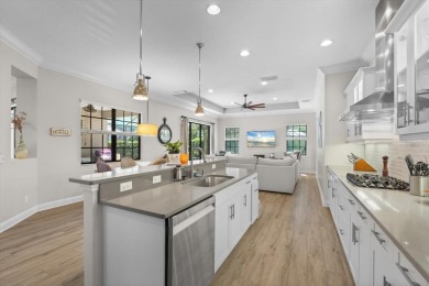 Situated in the desirable Country Club East of Lakewood Ranch on Ritz-Carlton Members Golf Club in Florida - for sale on GolfHomes.com, golf home, golf lot