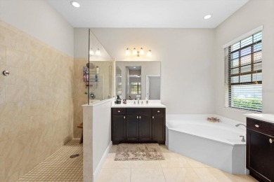 Situated in the desirable Country Club East of Lakewood Ranch on Ritz-Carlton Members Golf Club in Florida - for sale on GolfHomes.com, golf home, golf lot