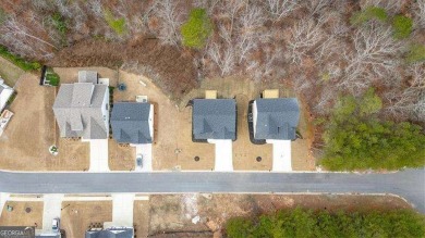 Welcome to the Travis floor plan - a thoughtfully designed 4 on The Plantation Golf Club in Georgia - for sale on GolfHomes.com, golf home, golf lot