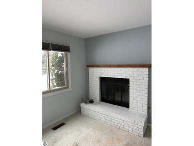 Green Meadows Condominiums ground-floor unit in a rare two-story on Bay Meadows Golf Course - Executive in Michigan - for sale on GolfHomes.com, golf home, golf lot