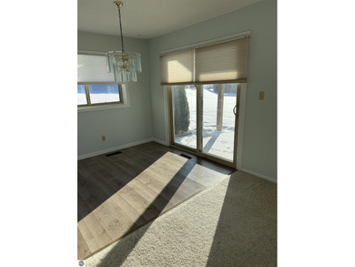 Green Meadows Condominiums ground-floor unit in a rare two-story on Bay Meadows Golf Course - Executive in Michigan - for sale on GolfHomes.com, golf home, golf lot