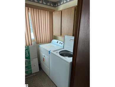 Green Meadows Condominiums ground-floor unit in a rare two-story on Bay Meadows Golf Course - Executive in Michigan - for sale on GolfHomes.com, golf home, golf lot