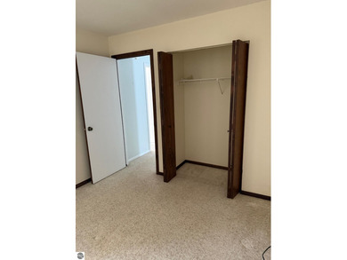 Green Meadows Condominiums ground-floor unit in a rare two-story on Bay Meadows Golf Course - Executive in Michigan - for sale on GolfHomes.com, golf home, golf lot