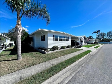 Welcome to this charming 2-bedroom, 2-bath home in the highly on Fairway Village Golf Course in Florida - for sale on GolfHomes.com, golf home, golf lot