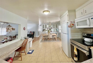 Welcome to this charming 2-bedroom, 2-bath home in the highly on Fairway Village Golf Course in Florida - for sale on GolfHomes.com, golf home, golf lot