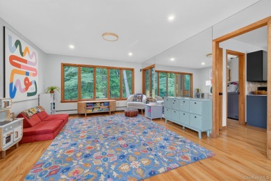 Nestled on nearly two acres of lush, tree-lined property, this on Hudson National Golf Club in New York - for sale on GolfHomes.com, golf home, golf lot