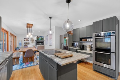 Nestled on nearly two acres of lush, tree-lined property, this on Hudson National Golf Club in New York - for sale on GolfHomes.com, golf home, golf lot