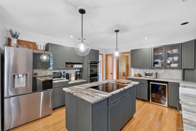 Nestled on nearly two acres of lush, tree-lined property, this on Hudson National Golf Club in New York - for sale on GolfHomes.com, golf home, golf lot