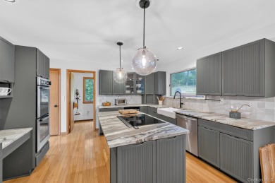 Nestled on nearly two acres of lush, tree-lined property, this on Hudson National Golf Club in New York - for sale on GolfHomes.com, golf home, golf lot