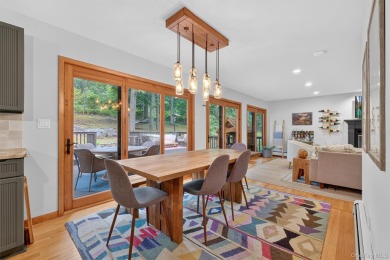 Nestled on nearly two acres of lush, tree-lined property, this on Hudson National Golf Club in New York - for sale on GolfHomes.com, golf home, golf lot