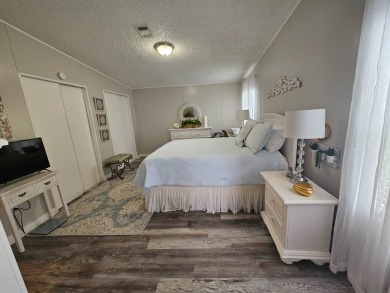 This immaculate 2-bedroom, 2-bath home has vinyl plank flooring on Big Cypress Golf and Country Club in Florida - for sale on GolfHomes.com, golf home, golf lot