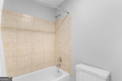 Remodeled Townhome Surrounded by Nature in Peachtree City on Canongate At Flat Creek Club in Georgia - for sale on GolfHomes.com, golf home, golf lot