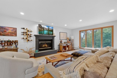 Nestled on nearly two acres of lush, tree-lined property, this on Hudson National Golf Club in New York - for sale on GolfHomes.com, golf home, golf lot