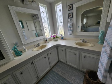 This immaculate 2-bedroom, 2-bath home has vinyl plank flooring on Big Cypress Golf and Country Club in Florida - for sale on GolfHomes.com, golf home, golf lot