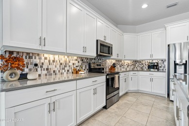 Welcome home! This stunning, meticulously maintained 3-bedroom on LPGA International Golf Course in Florida - for sale on GolfHomes.com, golf home, golf lot