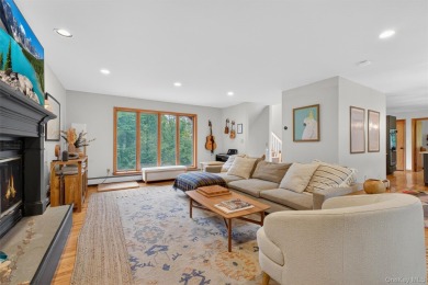 Nestled on nearly two acres of lush, tree-lined property, this on Hudson National Golf Club in New York - for sale on GolfHomes.com, golf home, golf lot