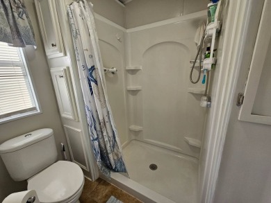 This immaculate 2-bedroom, 2-bath home has vinyl plank flooring on Big Cypress Golf and Country Club in Florida - for sale on GolfHomes.com, golf home, golf lot