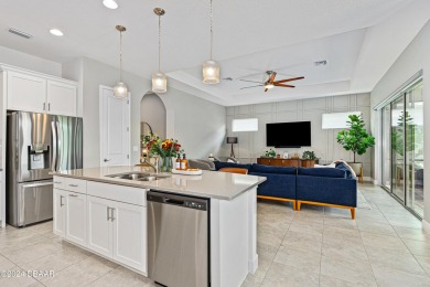 Welcome home! This stunning, meticulously maintained 3-bedroom on LPGA International Golf Course in Florida - for sale on GolfHomes.com, golf home, golf lot