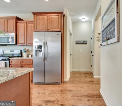 4 bedrooms and 3 full baths, including a spacious owner's suite on Summergrove Golf Club in Georgia - for sale on GolfHomes.com, golf home, golf lot