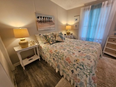 This immaculate 2-bedroom, 2-bath home has vinyl plank flooring on Big Cypress Golf and Country Club in Florida - for sale on GolfHomes.com, golf home, golf lot