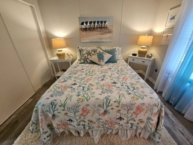 This immaculate 2-bedroom, 2-bath home has vinyl plank flooring on Big Cypress Golf and Country Club in Florida - for sale on GolfHomes.com, golf home, golf lot