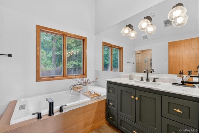 Nestled on nearly two acres of lush, tree-lined property, this on Hudson National Golf Club in New York - for sale on GolfHomes.com, golf home, golf lot