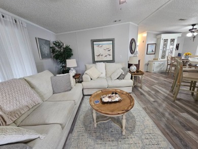 This immaculate 2-bedroom, 2-bath home has vinyl plank flooring on Big Cypress Golf and Country Club in Florida - for sale on GolfHomes.com, golf home, golf lot