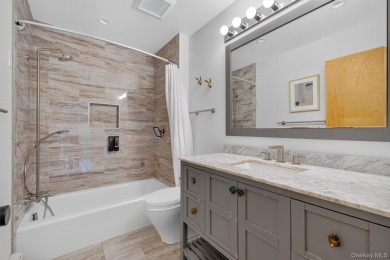 Nestled on nearly two acres of lush, tree-lined property, this on Hudson National Golf Club in New York - for sale on GolfHomes.com, golf home, golf lot