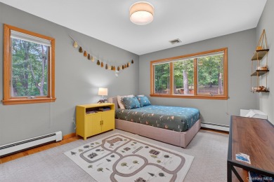 Nestled on nearly two acres of lush, tree-lined property, this on Hudson National Golf Club in New York - for sale on GolfHomes.com, golf home, golf lot