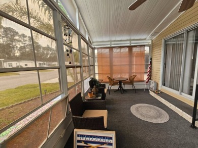 This immaculate 2-bedroom, 2-bath home has vinyl plank flooring on Big Cypress Golf and Country Club in Florida - for sale on GolfHomes.com, golf home, golf lot