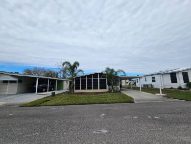 This immaculate 2-bedroom, 2-bath home has vinyl plank flooring on Big Cypress Golf and Country Club in Florida - for sale on GolfHomes.com, golf home, golf lot