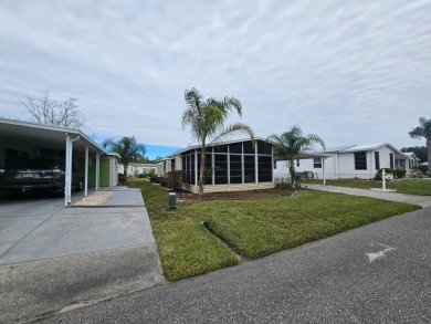 This immaculate 2-bedroom, 2-bath home has vinyl plank flooring on Big Cypress Golf and Country Club in Florida - for sale on GolfHomes.com, golf home, golf lot