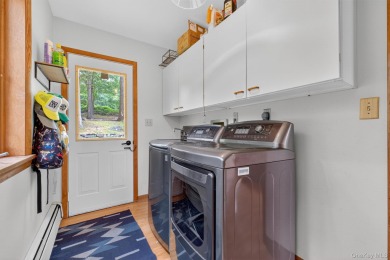 Nestled on nearly two acres of lush, tree-lined property, this on Hudson National Golf Club in New York - for sale on GolfHomes.com, golf home, golf lot