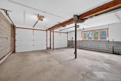 Nestled on nearly two acres of lush, tree-lined property, this on Hudson National Golf Club in New York - for sale on GolfHomes.com, golf home, golf lot