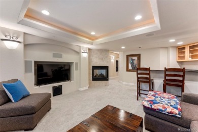 Discover luxury, convenience, and serenity in this stunning home on Country Club at Castle Pines in Colorado - for sale on GolfHomes.com, golf home, golf lot