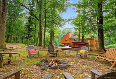 Nestled on nearly two acres of lush, tree-lined property, this on Hudson National Golf Club in New York - for sale on GolfHomes.com, golf home, golf lot
