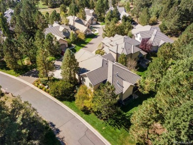 Discover luxury, convenience, and serenity in this stunning home on Country Club at Castle Pines in Colorado - for sale on GolfHomes.com, golf home, golf lot