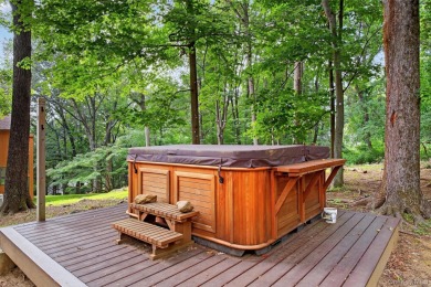 Nestled on nearly two acres of lush, tree-lined property, this on Hudson National Golf Club in New York - for sale on GolfHomes.com, golf home, golf lot