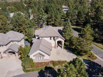 Discover luxury, convenience, and serenity in this stunning home on Country Club at Castle Pines in Colorado - for sale on GolfHomes.com, golf home, golf lot