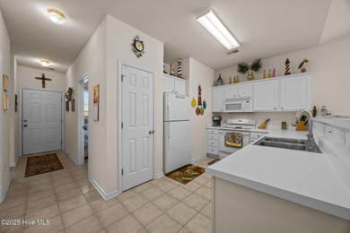 Looking for turnkey ready, vacation, primary home, or investment on Sandpiper Bay Golf and Country Club in North Carolina - for sale on GolfHomes.com, golf home, golf lot